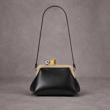 Monroe Frame Clutch